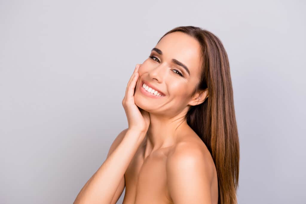 A woman smiling after an IPL photofacial